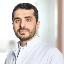 Op. Dr. Necdet Demir — Kulak Burun Boğaz, İstanbul. Portre fotoğrafı.