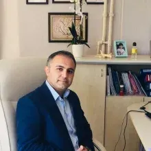 Doç. Dr. Çağatay Uğur — Çocuk ve Ergen Psikiyatrisi, Ankara. Portre fotoğrafı.