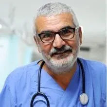 Op. Dr. Metin Kuş — Genel Cerrahi, İstanbul. Portre fotoğrafı.