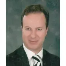Doç. Dr. Murat Yılmaz — Beyin Ve Sinir Cerrahisi, İzmir. Portre fotoğrafı.