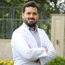 Uzm. Dr. Huzeyfe Barham — Psikiyatri, Antalya. Portre fotoğrafı.