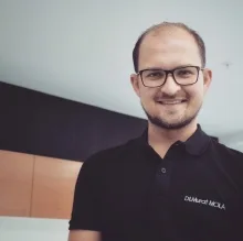 Dt. Murat Mola — Diş Hekimi, Manisa. Portre fotoğrafı.