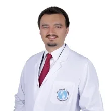 Op. Dr. Hüseyin Öztürk — Ortopedi Ve Travmatoloji, İzmir. Portre fotoğrafı.