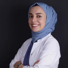 Dt. S.Belkıs Teke — Diş Hekimi. Portre fotoğrafı.