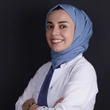 Dt. S.Belkıs Teke — Diş Hekimi. Portre fotoğrafı.