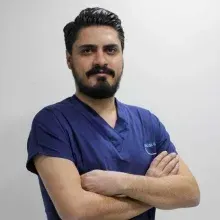 Dt. Mehmet Beşir Alp — Diş Hekimi, Siirt. Portre fotoğrafı.