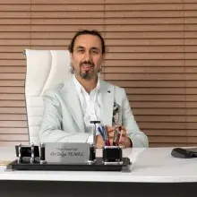 Dr. Tolga Temel — Antalya. Portre fotoğrafı.