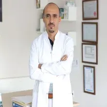 Uzm. Dr. Okay Koç — Genel Cerrahi, Aydın. Portre fotoğrafı.