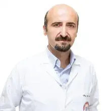 Prof. Dr. Mustafa Saçar — Kalp Ve Damar Cerrahisi, Denizli. Portre fotoğrafı.