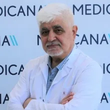 Uzm. Dr. Hikmet Aloğlu — Nöroloji, Nilüfer, Bursa. Portre fotoğrafı.