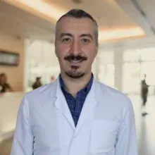 Uzm. Dr. Yılmaz Ömür Otlu — Kardiyoloji, Kuşadası, Aydın. Portre fotoğrafı.