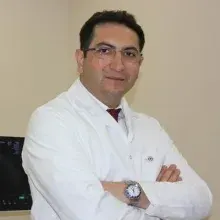 Doç. Dr. Ali Seven — Ankara. Portre fotoğrafı.