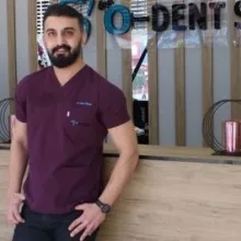 Dt. Oktay Özcan — Diş Hekimi, İstanbul. Portre fotoğrafı.
