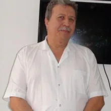 Dt. Mehmet İşlek — Diş Hekimi, Antalya. Portre fotoğrafı.