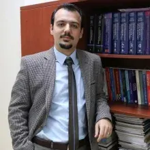 Doç. Dr. Gökay Alpak — Psikiyatri, Gaziantep. Portre fotoğrafı.