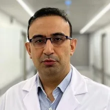 Doç. Dr. Hasan Hüseyin Özdemir — Nöroloji, Avcılar, İstanbul. Portre fotoğrafı.