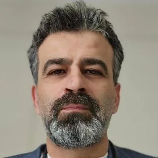 Doç. Dr. Ozan Koçak — Samsun. Portre fotoğrafı.