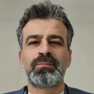 Doç. Dr. Ozan Koçak — Samsun. Portre fotoğrafı.
