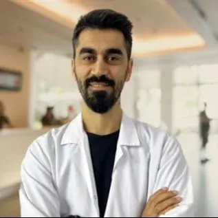 Op. Dr. Cihan Karatay — Kulak Burun Boğaz, Aydın. Portre fotoğrafı.
