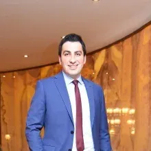 Dt. İsmail Doğan Deliktaş — Diş Hekimi, Mersin. Portre fotoğrafı.
