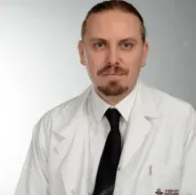 Uzm. Dr. Hakkı Akman — Çocuk Sağlığı Ve Hastalıkları, Çankaya, Ankara. Portre fotoğrafı.