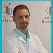 Uzm. Dr. Ceyhun Bıcılıoğlu — Fiziksel Tıp Ve Rehabilitasyon, İzmir. Portre fotoğrafı.