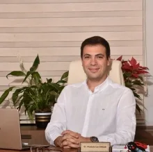 Uzm. Dr. Mustafa Can Erkan — Çocuk ve Ergen Psikiyatrisi, Antalya. Portre fotoğrafı.