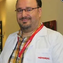 Op. Dr. Tonguç Gündüz — Kadın Hastalıkları Ve Doğum, Antalya. Portre fotoğrafı.