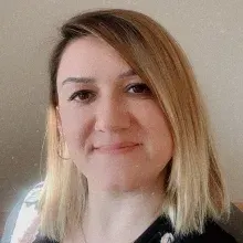 Doç. Dr. Canan Kuygun Karcı — Çocuk ve Ergen Psikiyatrisi, Adana. Portre fotoğrafı.