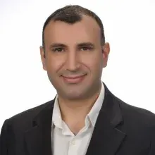 Doç. Dr. Gökhan Demirayak — Şişli, İstanbul. Portre fotoğrafı.