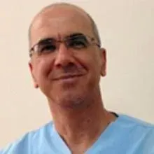 Op. Dr. Nizam Kurtdere — Genel Cerrahi, İstanbul. Portre fotoğrafı.