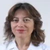 Uzm. Dr. Tümay Doğancı — Çocuk Gastroenterolojisi, Çankaya, Ankara. Portre fotoğrafı.