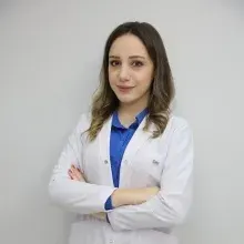 Dt. Miray Taflı — Diş Hekimi, Kayseri. Portre fotoğrafı.