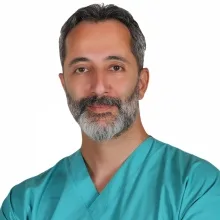 Op. Dr. Kemal Özcan — Kulak Burun Boğaz, Ankara. Portre fotoğrafı.