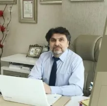 Doç. Dr. Aydın Köşüş — Ankara. Portre fotoğrafı.