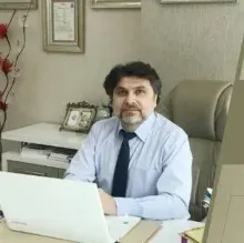 Doç. Dr. Aydın Köşüş — Ankara. Portre fotoğrafı.