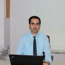Dr. Öğr. Üyesi Kamil Gökçe Tulacı — Kulak Burun Boğaz, Balıkesir. Portre fotoğrafı.