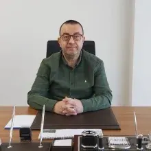 Uzm. Dr. Mustafa Hikmet Tunçkol — Psikiyatri, Bursa. Portre fotoğrafı.