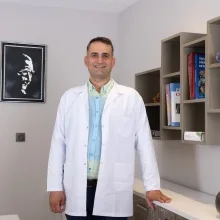 Doç. Dr. Bülent Özdemir — Ortopedi Ve Travmatoloji, Adana. Portre fotoğrafı.