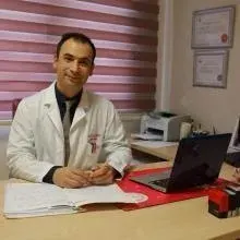 Prof. Dr. Erhan Şimşek — Adana. Portre fotoğrafı.