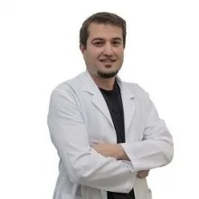 Uzm. Dt. Onur Gezgin — Çocuk Diş Hekimliği (Pedodonti), Selçuklu, Konya. Portre fotoğrafı.