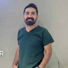 Uzm. Dt. Ayhan Doğan. Portre fotoğrafı.