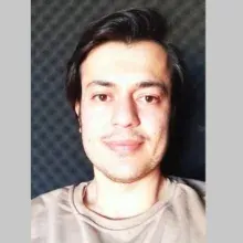 Dkt. Alaaddin Kandemir — Dil ve Konuşma Terapisi. Portre fotoğrafı.