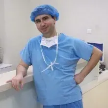 Op. Dr. Erhan Karabuğa — Ortopedi Ve Travmatoloji, Antalya. Portre fotoğrafı.