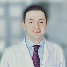 Op. Dr. M. Enis Ekincioğlu — Kulak Burun Boğaz, Kadıköy, İstanbul. Portre fotoğrafı.