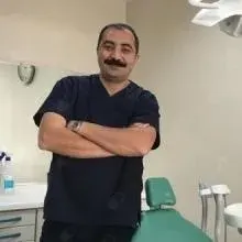 Dt. Murat Ataş — Diş Hekimi, Ankara. Portre fotoğrafı.