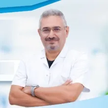 Op. Dr. Mehmet Akaçin — Ortopedi Ve Travmatoloji, Balçova, İzmir. Portre fotoğrafı.