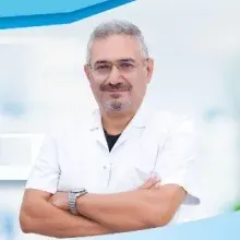 Op. Dr. Mehmet Akaçin — Ortopedi Ve Travmatoloji, Balçova, İzmir. Portre fotoğrafı.
