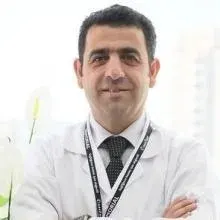Op. Dr. İ.Burhan Özel — Kadın Hastalıkları Ve Doğum, Diyarbakır. Portre fotoğrafı.