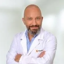 Op. Dr. Altan Kaman — Göz Hastalıkları, Ankara. Portre fotoğrafı.